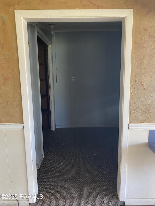 hallway with a textured wall