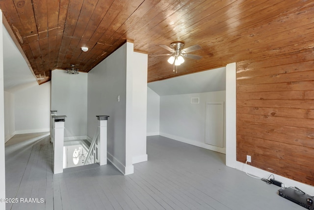 bonus room with hardwood / wood-style flooring, wood ceiling, and vaulted ceiling