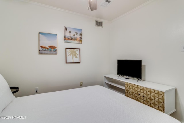 bedroom featuring ceiling fan, ornamental molding, and visible vents