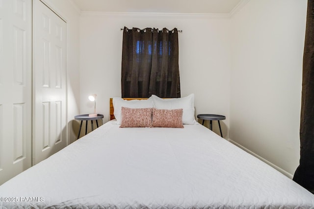 bedroom with ornamental molding