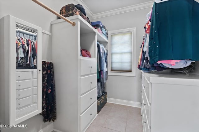 spacious closet with light tile patterned floors