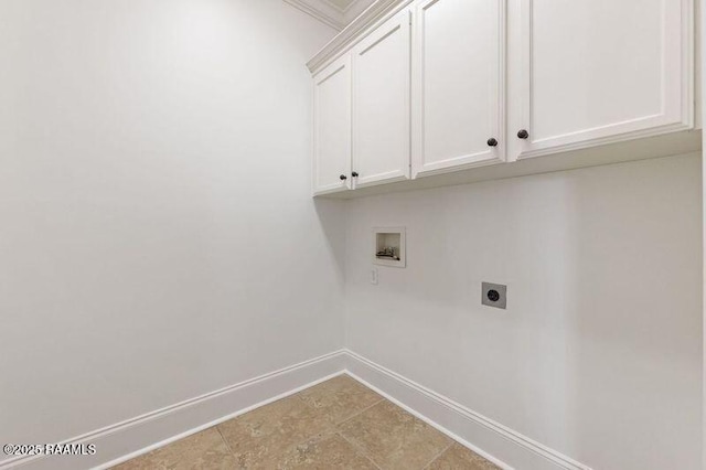 laundry room featuring cabinet space, hookup for a washing machine, baseboards, and hookup for an electric dryer