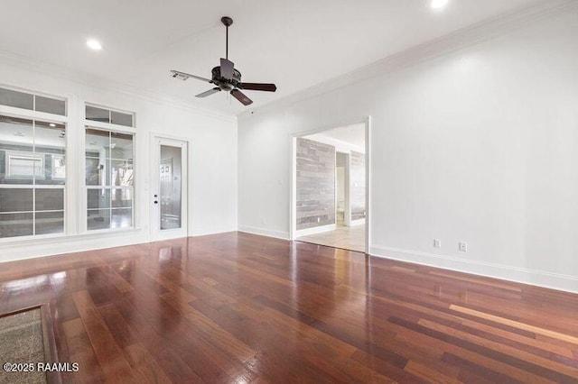 interior space with ceiling fan, recessed lighting, baseboards, ornamental molding, and hardwood / wood-style floors