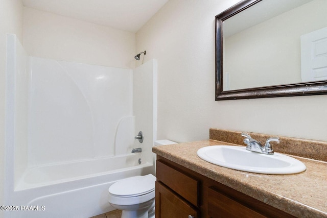 bathroom with toilet, bathtub / shower combination, and vanity