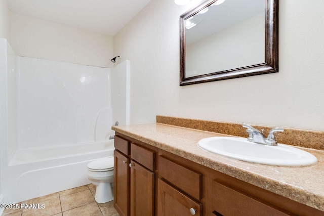 full bathroom featuring toilet, tile patterned flooring, vanity, and shower / bathtub combination