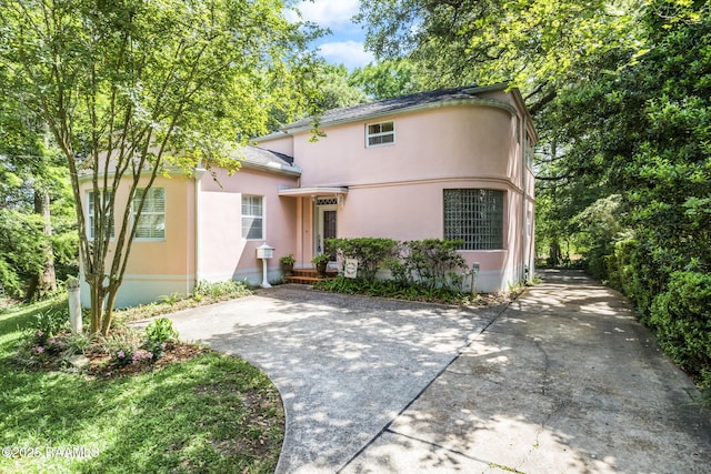 view of front of house featuring stucco siding