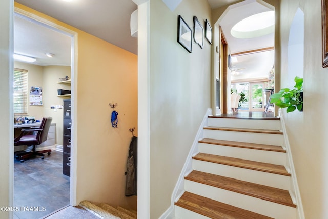 stairway with baseboards