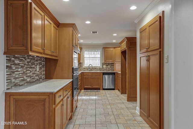 kitchen featuring light stone countertops, brown cabinetry, visible vents, and stainless steel appliances