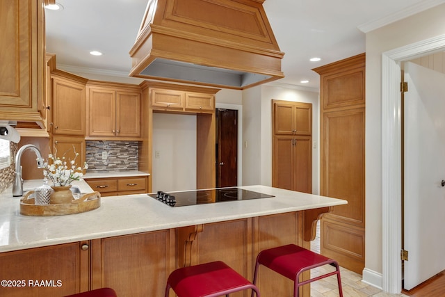 kitchen featuring crown molding, tasteful backsplash, premium range hood, a peninsula, and black electric cooktop