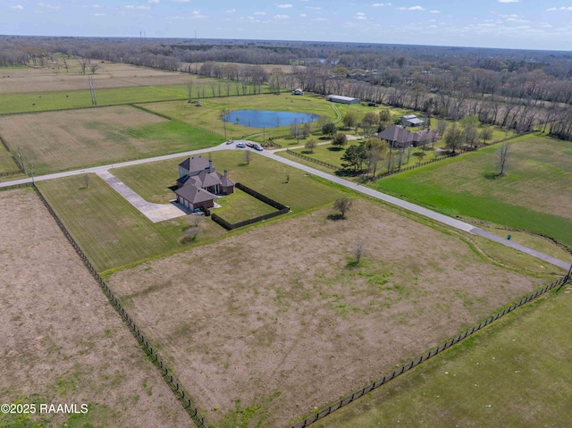 aerial view with a rural view and a water view