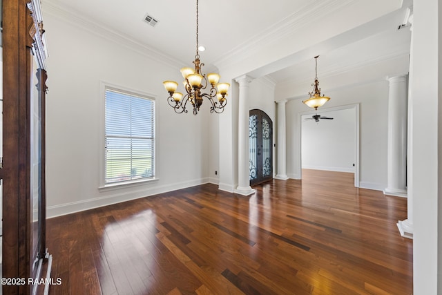 spare room with visible vents, baseboards, dark wood finished floors, decorative columns, and ceiling fan with notable chandelier