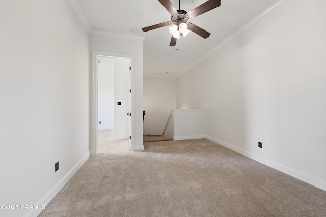 unfurnished room featuring ceiling fan, baseboards, light carpet, and ornamental molding