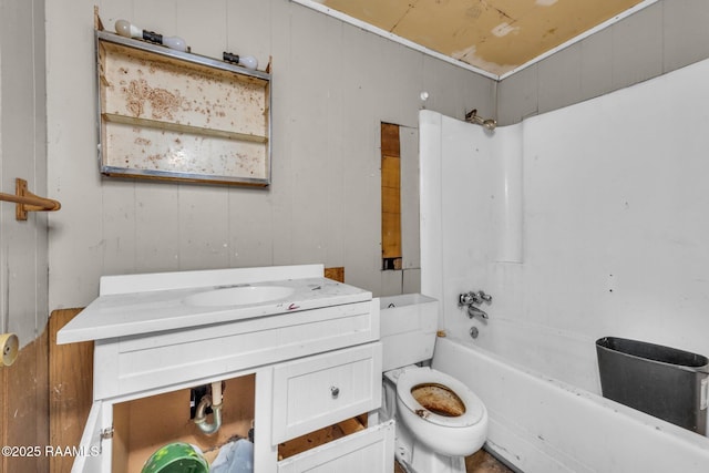 full bath with shower / bathtub combination, vanity, and toilet