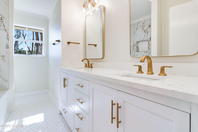 bathroom with crown molding, double vanity, and a sink