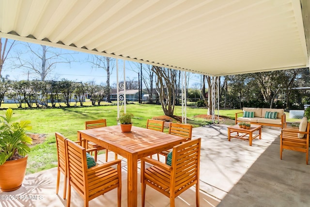 view of patio / terrace with an outdoor living space and outdoor dining area