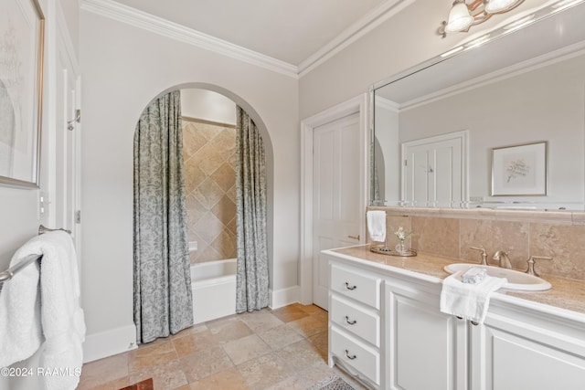 full bath featuring baseboards, ornamental molding, decorative backsplash, and vanity