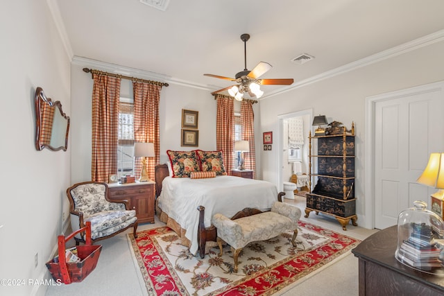 carpeted bedroom with ornamental molding, visible vents, and a ceiling fan