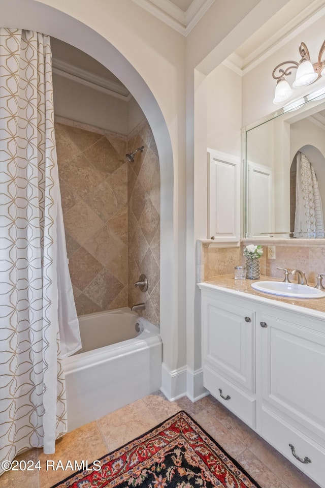 full bath featuring vanity, baseboards, ornamental molding, backsplash, and shower / bath combo with shower curtain