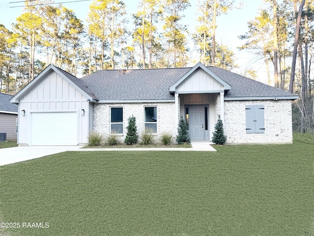 view of front facade featuring a front lawn, board and batten siding, and brick siding