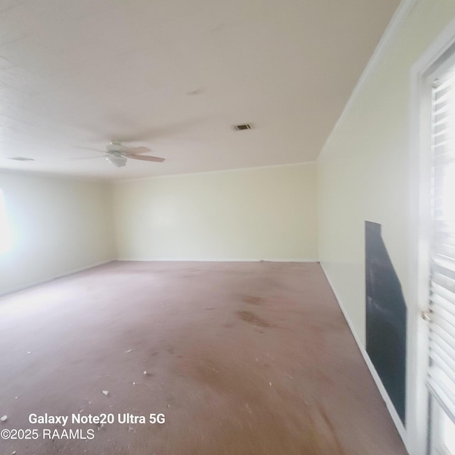 unfurnished room with ceiling fan, concrete floors, and visible vents