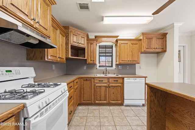 kitchen with white appliances, visible vents, a sink, under cabinet range hood, and crown molding