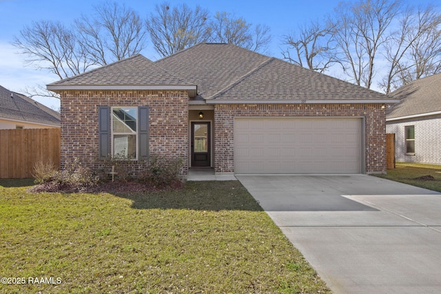 view of front of property featuring an attached garage, fence, driveway, roof with shingles, and a front lawn