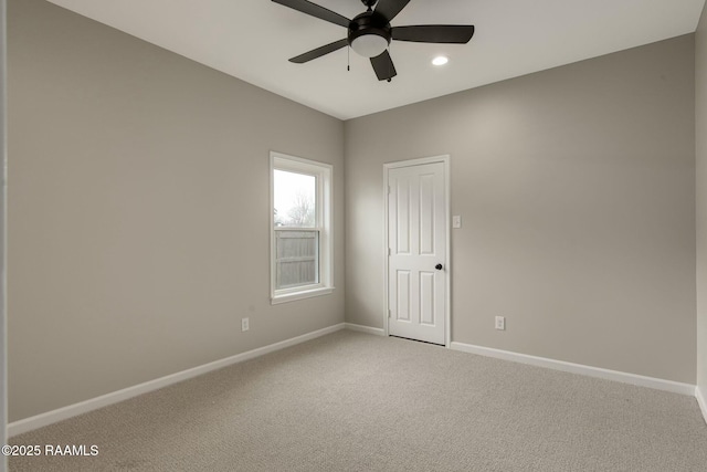 empty room with light carpet, baseboards, a ceiling fan, and recessed lighting