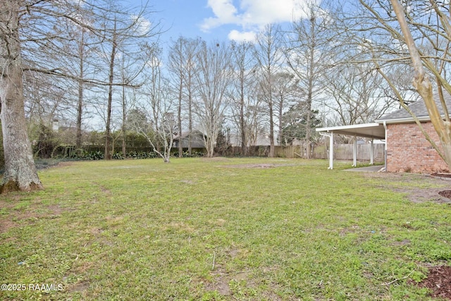 view of yard with fence