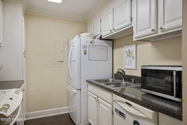 110 W Bayou Pkwy Unit 401, Lafayette, LA 70503 - kitchen with white appliances, a sink, white cabinets, dark wood-style floors, and crown molding