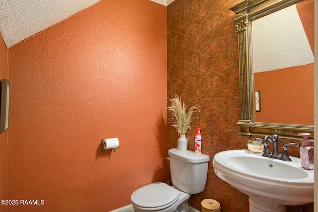 110 W Bayou Pkwy Unit 401, Lafayette, LA 70503 - bathroom featuring a sink and toilet