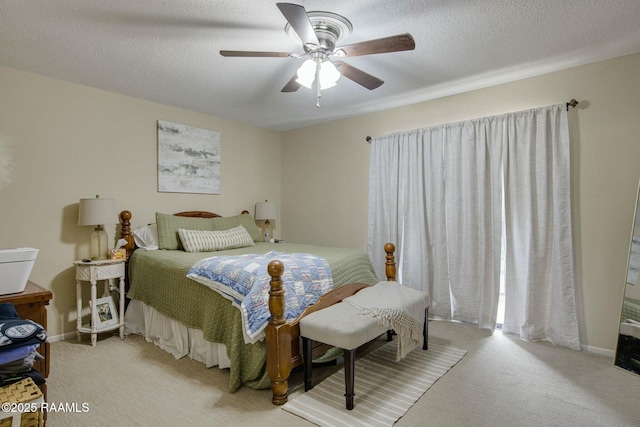 110 W Bayou Pkwy Unit 401, Lafayette, LA 70503 - bedroom featuring light carpet, a textured ceiling, and ceiling fan