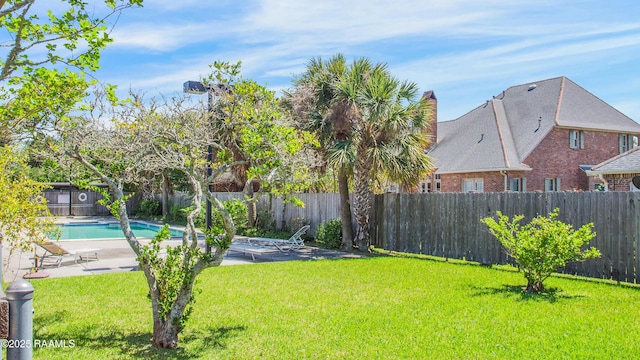 416 Doucet Rd Unit 5A, Lafayette, LA 70503 - view of yard featuring a fenced in pool, a patio, and a fenced backyard