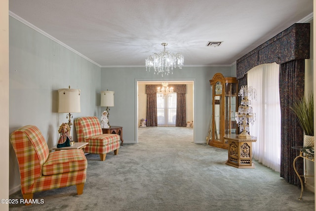 sitting room featuring visible vents, carpet, crown molding, baseboards, and a chandelier