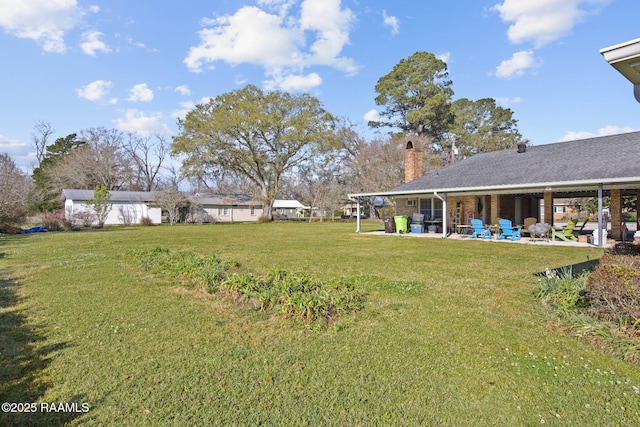 view of yard featuring a patio