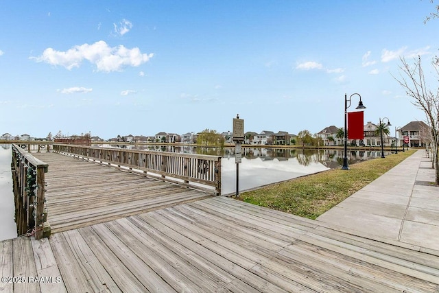 dock area featuring a water view