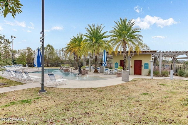 exterior space with a patio, a lawn, a pool, and a pergola