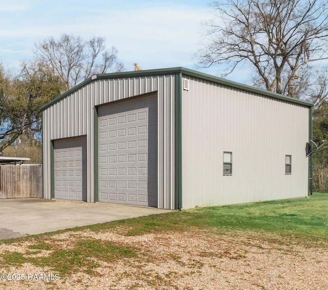 detached garage with fence