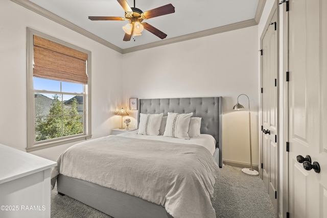 carpeted bedroom with ornamental molding and a ceiling fan