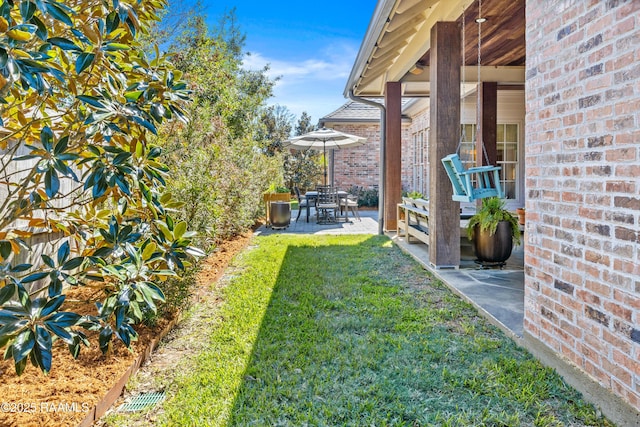 view of yard with a patio area