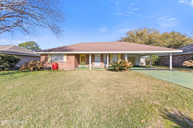 ranch-style house featuring a front lawn, a carport, covered porch, concrete driveway, and brick siding