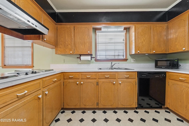 kitchen with light floors, a sink, black appliances, light countertops, and under cabinet range hood