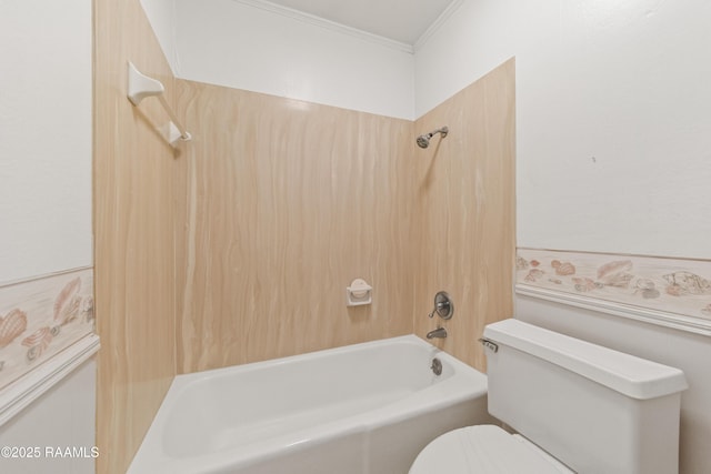 bathroom with toilet, shower / bathtub combination, and ornamental molding