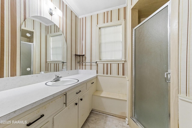 bathroom featuring wallpapered walls, a shower stall, vanity, and tile patterned flooring