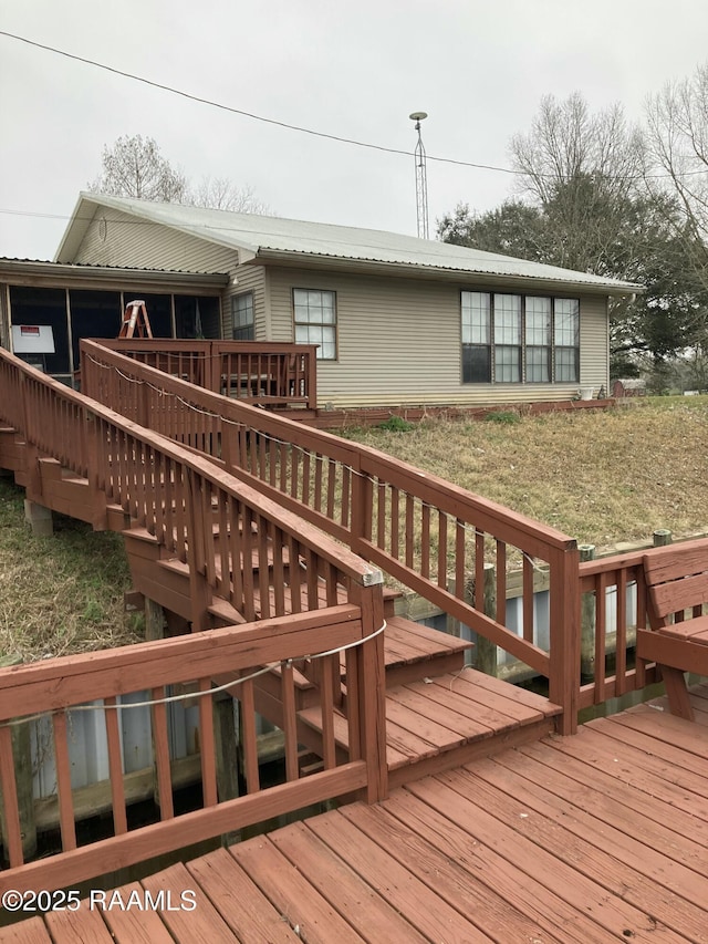 wooden terrace featuring stairway