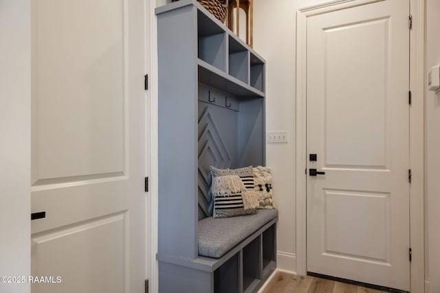 mudroom with light wood-style flooring