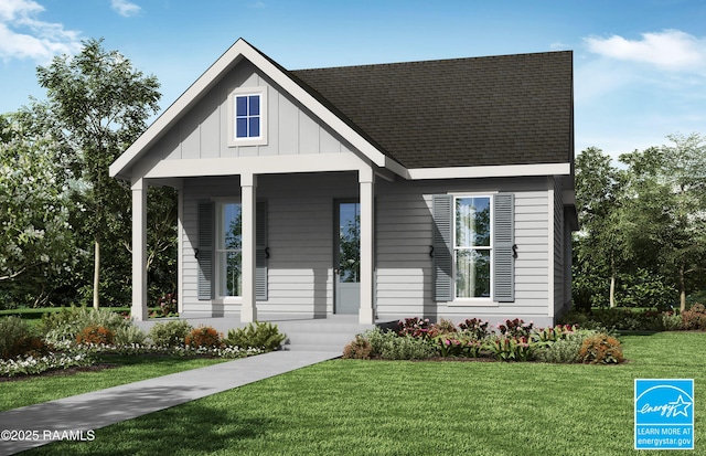 view of front facade featuring a porch, board and batten siding, and a front yard