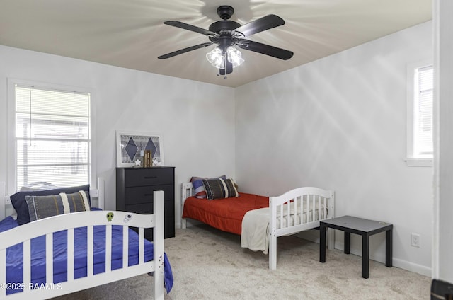 bedroom featuring carpet floors and ceiling fan