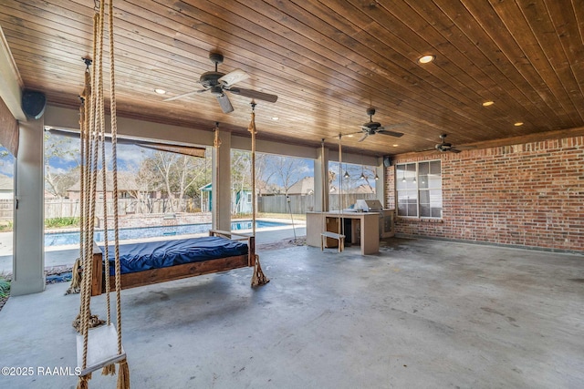 view of patio / terrace featuring fence and a fenced in pool