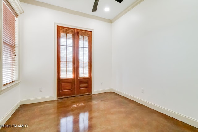 interior space with baseboards, ceiling fan, finished concrete flooring, and a healthy amount of sunlight