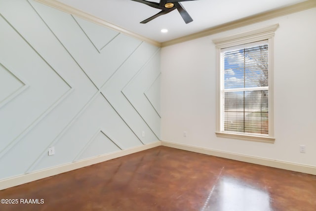 spare room featuring concrete flooring, crown molding, a ceiling fan, and baseboards